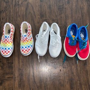 Like new size 1 Vans( white,checker multi color and red blue and yellow)